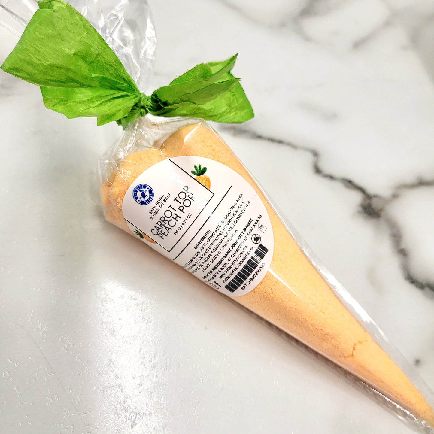 A bath bomb that looks like a carrot and smells like peaches.